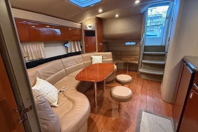 Slide: The Image of Luxurious interior of 2006 Formula 40 Performance Cruiser with leather seating and wooden accents. - 39