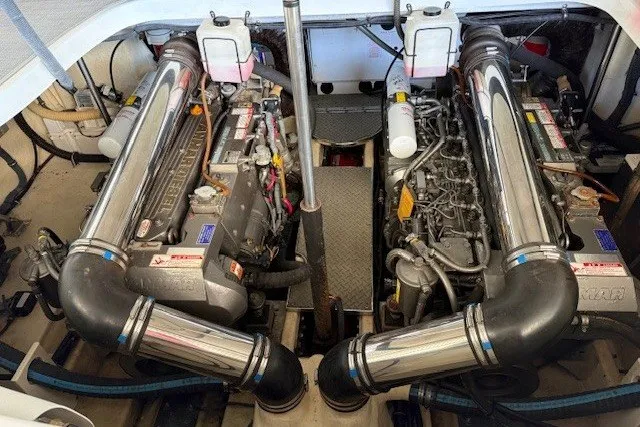 Slide: The Image of Engine compartment of a 2006 Formula 40 Performance Cruiser with dual engines and polished components. - 23