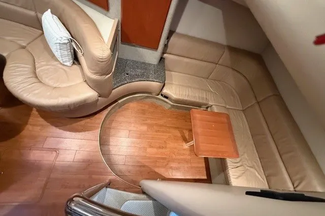 Slide: The Image of Interior of 2006 Formula 40 Performance Cruiser with leather seating and wooden flooring. - 26