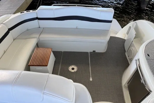 Slide: The Image of 2006 Formula 40 Performance Cruiser interior with white seating and wooden accents. - 9