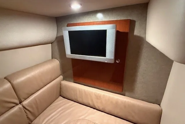 Slide: The Image of Interior of 2006 Formula 40 Performance Cruiser with TV and beige seating. - 44