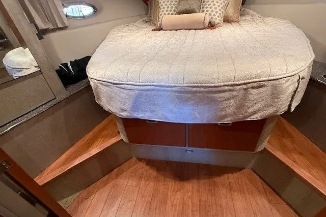 Slide: The Image of Interior cabin of 2006 Formula 40 Performance Cruiser with cozy bed and wooden flooring. - 36