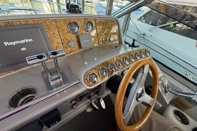 Slide: The Image of Helm of 2006 Formula 40 Performance Cruiser with Raymarine navigation system and wood-accented steering wheel. - 17