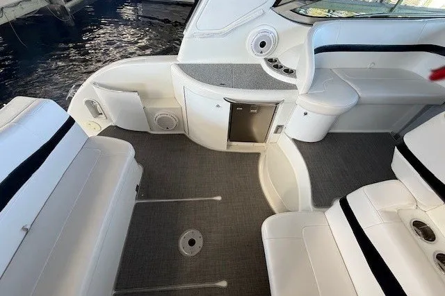 Slide: The Image of 2006 Formula 40 Performance Cruiser interior with white seating and gray flooring. - 16