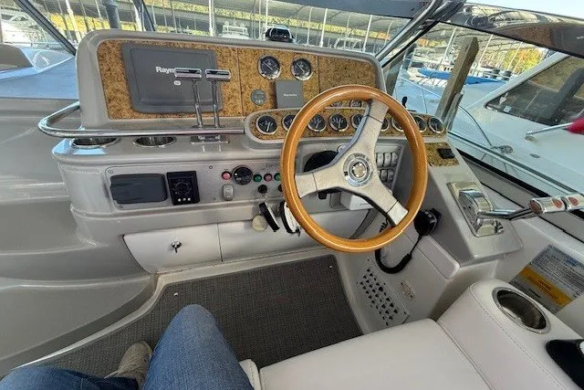 Slide: The Image of Cockpit of 2006 Formula 40 Performance Cruiser with steering wheel and control panel. - 14