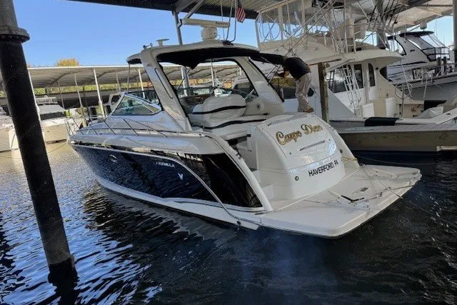 Slide: The Image of 2006 Formula 40 Performance Cruiser docked in marina, rear view. - 0