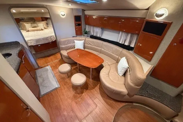 Slide: The Image of Luxurious interior of a 2006 Formula 40 Performance Cruiser with elegant seating and wood finishes. - 31