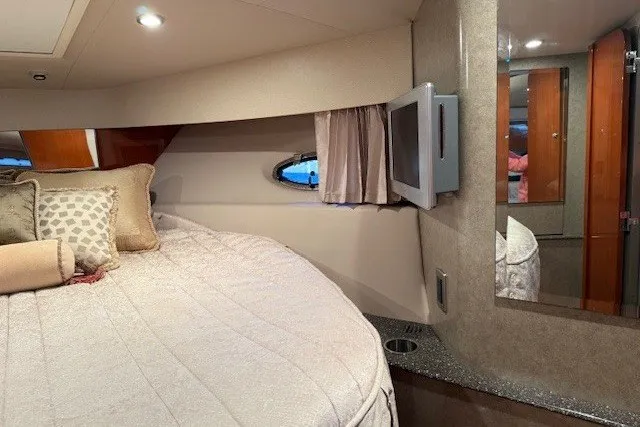 Slide: The Image of Interior of 2006 Formula 40 Performance Cruiser with cozy bed and small TV. - 35