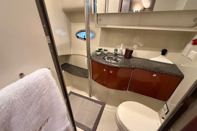 Slide: The Image of Luxurious bathroom in 2006 Formula 40 Performance Cruiser with modern fixtures and elegant design. - 28