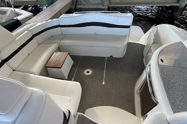 Slide: The Image of 2006 Formula 40 Performance Cruiser interior with white seating and gray flooring. - 12