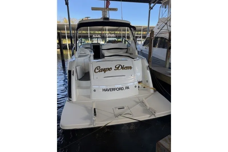 Slide: The Image of 2006 Formula 40 Performance Cruiser docked, named "Carpe Diem," in Haverford, PA. - 2