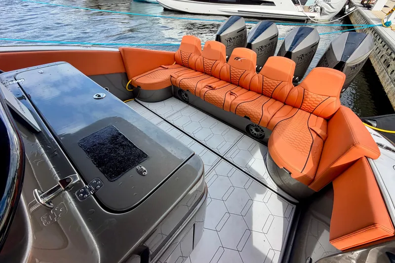 Slide: The Image of Luxury seating on 2025 Midnight Express 43 Solstice boat with powerful engines. - 5