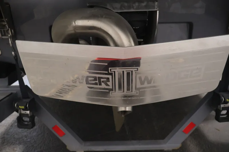 Slide: The Image of Rear view of 2025 Axis T250 boat with Power Wedge III feature. - 56