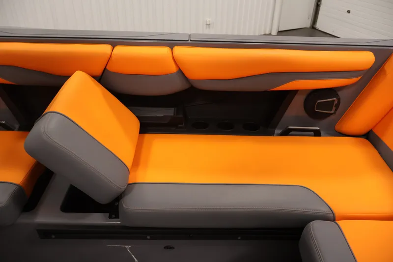Slide: The Image of 2025 Axis T250 boat interior with orange and gray seating, showcasing modern design. - 37