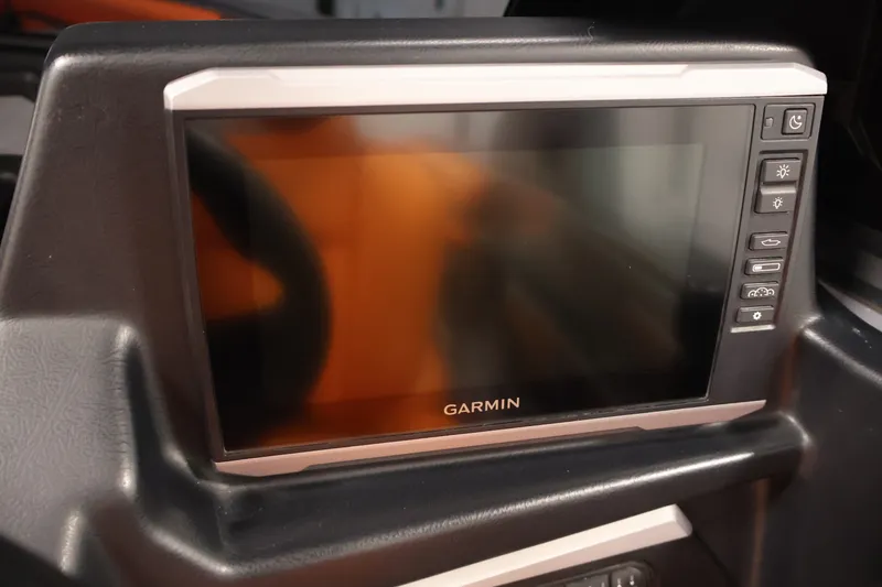 Slide: The Image of Garmin display in 2025 Axis T250 boat, featuring control buttons and sleek design. - 22