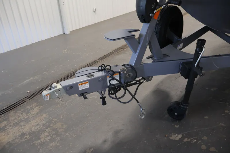 Slide: The Image of Trailer hitch of 2025 Axis T250 in a garage setting. - 50