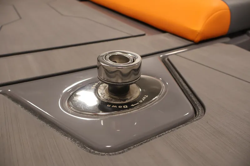 Slide: The Image of Axis T250 2025 boat detail, featuring a sleek metal fitting on a gray deck. - 47