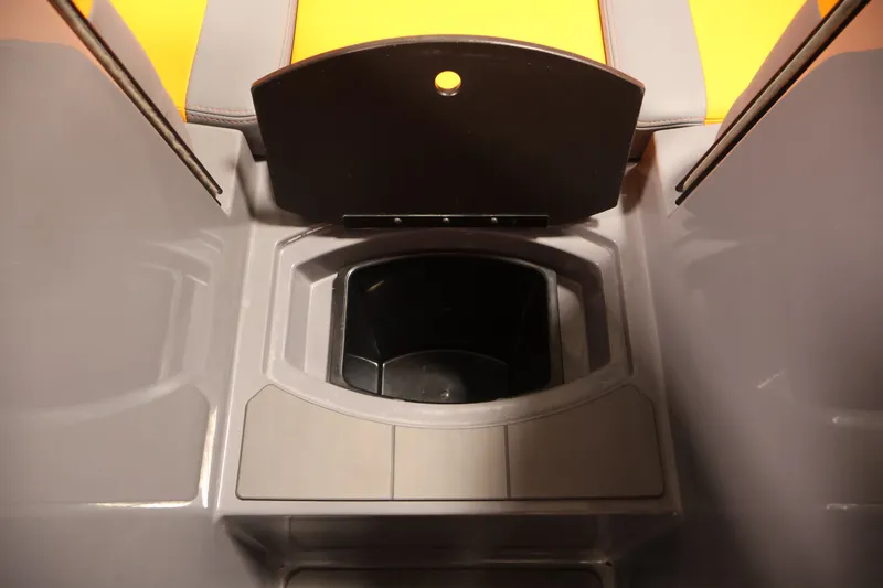 Slide: The Image of Interior view of 2025 Axis T250 boat storage compartment with open lid. - 16