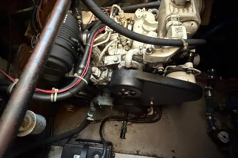 Slide: The Image of Engine compartment of a 1971 Bertram 35 Sport Fisherman boat, showing mechanical components. - 37