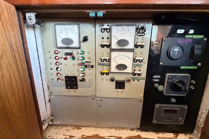 Slide: The Image of Electrical control panel on a 1971 Bertram 35 Sport Fisherman boat. - 33