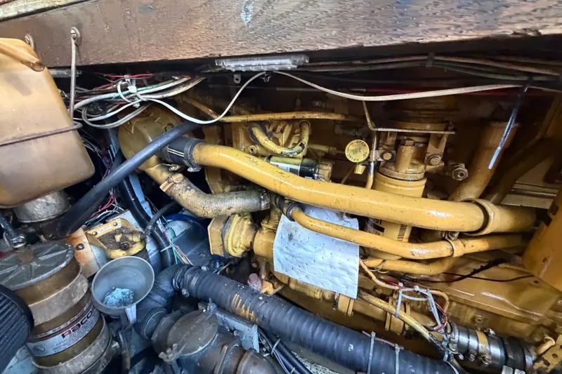 Slide: The Image of Engine compartment of a 1971 Bertram 35 Sport Fisherman with visible wiring and components. - 41