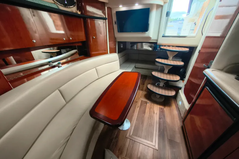 Slide: The Image of Luxurious interior of 2006 Sea Ray 340 Sundancer yacht with elegant wood finishes. - 21