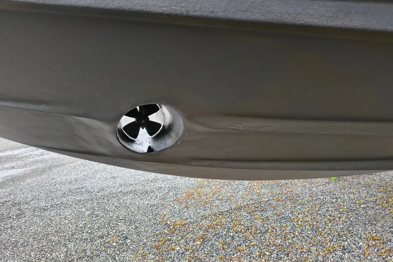 Slide: The Image of Bow thruster on a 2006 Sea Ray 340 Sundancer boat hull. - 3