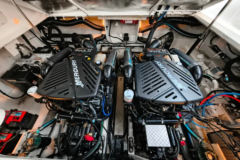 Slide: The Image of Engine room of a 2006 Sea Ray 340 Sundancer with twin Mercury engines. - 25