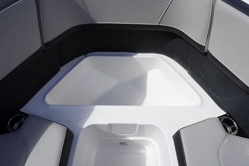 Slide: The Image of Interior seating of 2026 Monterey 255SS Super Sport boat, featuring sleek gray upholstery. - 32