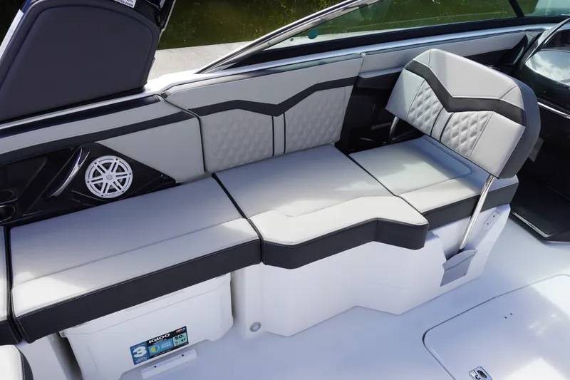 Slide: The Image of 2026 Monterey 255SS Super Sport boat interior with stylish seating and speaker system. - 18