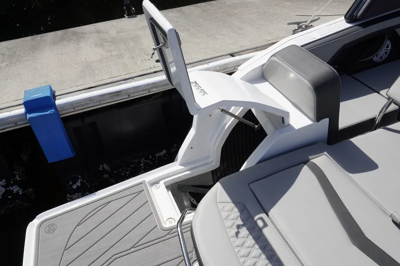 Slide: The Image of 2026 Monterey 255SS Super Sport boat interior with seating and swim platform. - 13