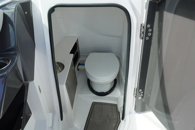 Slide: The Image of Interior view of 2026 Monterey 255SS Super Sport boat bathroom. - 29