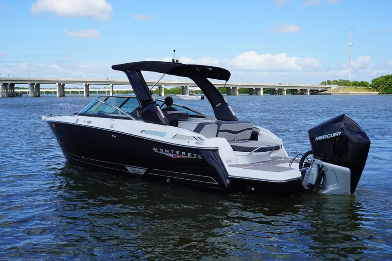 Slide: The Image of 2026 Monterey 255SS Super Sport boat on water, featuring sleek design and powerful Mercury engine. - 4