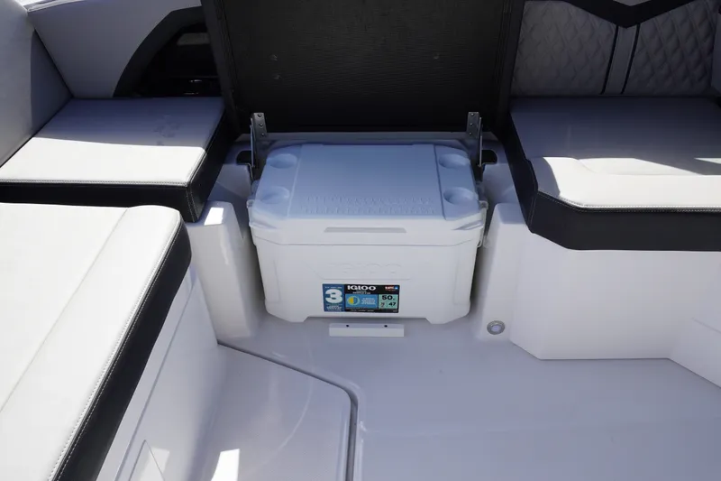 Slide: The Image of Interior of 2026 Monterey 255SS Super Sport boat with built-in cooler. - 17