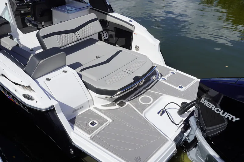 Slide: The Image of 2026 Monterey 255SS Super Sport boat with sleek seating and Mercury engine on water. - 10