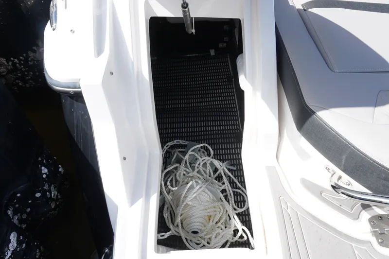 Slide: The Image of Storage compartment with rope on a 2026 Monterey 255SS Super Sport boat. - 14