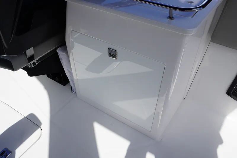 Slide: The Image of 2026 Monterey 255SS Super Sport boat interior storage compartment with sleek design. - 21