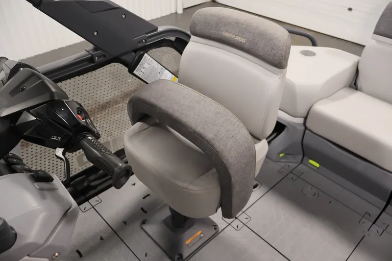 Slide: The Image of 2023 Sea-Doo Switch Sport Compact interior with steering and seating details. - 25