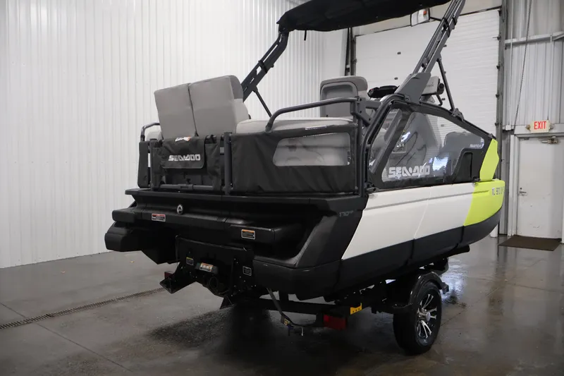 The Image of 2023 Sea-Doo Switch Sport Compact in a showroom, showcasing sleek design and modern features. - 0