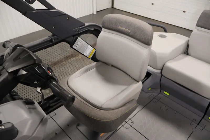 Slide: The Image of 2023 Sea-Doo Switch Sport Compact interior with steering and seating details. - 24