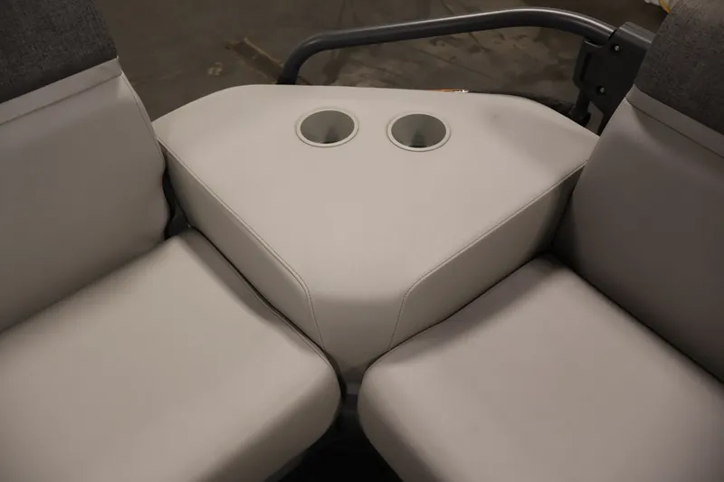 Slide: The Image of 2023 Sea-Doo Switch Sport Compact seating area with cup holders. - 32
