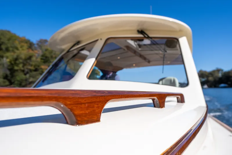 Slide: The Image of 2017 Hinckley Picnic Boat 37 MKIII, elegant design, cruising on a sunny day. - 50