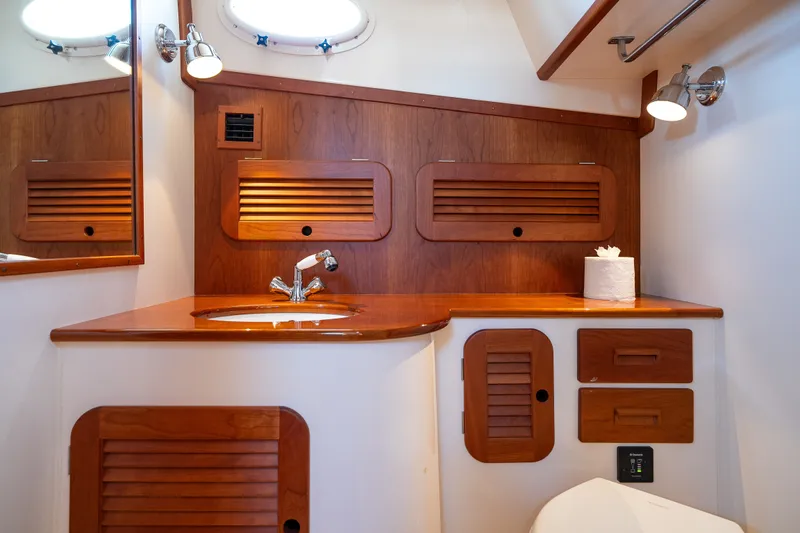 Slide: The Image of Luxurious wooden bathroom interior of 2017 Hinckley Picnic Boat 37 MKIII. - 42