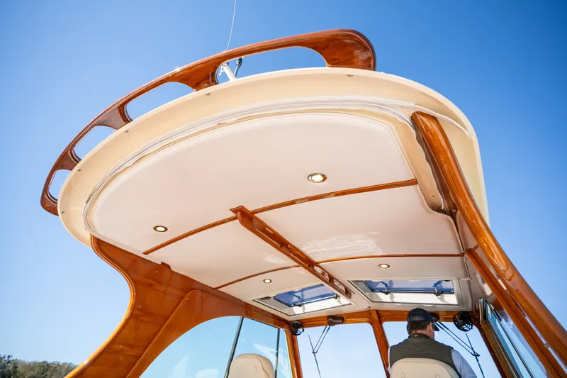 Slide: The Image of 2017 Hinckley Picnic Boat 37 MKIII with elegant wooden details and modern design. - 18