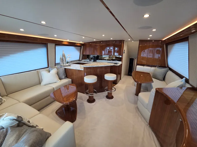 Slide: The Image of Interior of a luxury yacht with elegant wood furnishings and comfortable seating. - 14