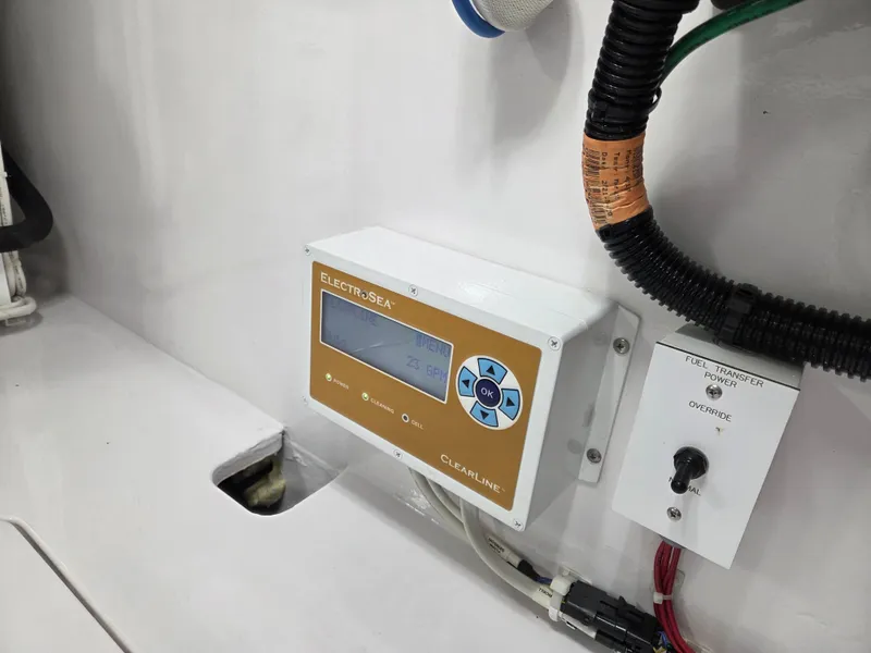Slide: The Image of A control unit with a digital display and buttons is mounted on a white wall. - 33