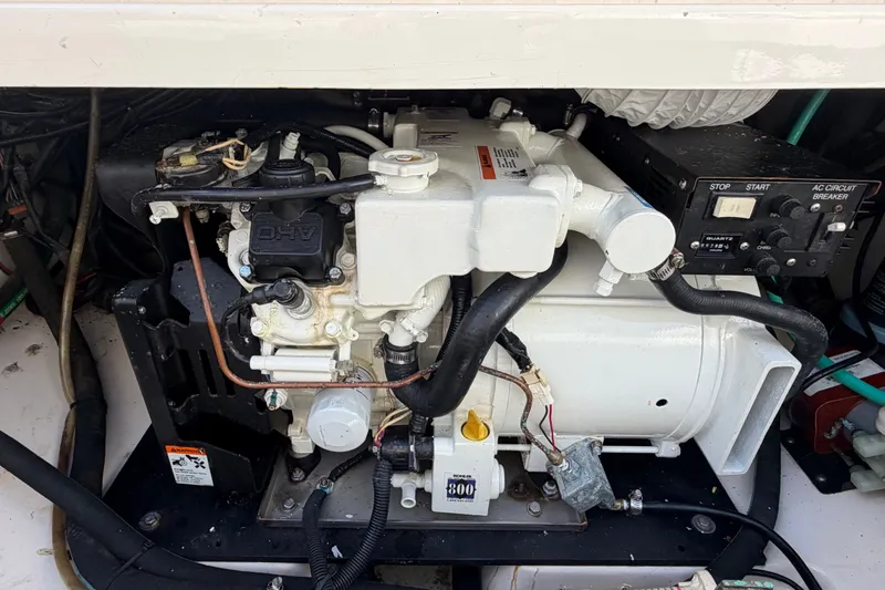 Slide: The Image of Engine compartment of a 2014 Boston Whaler 315 Conquest boat. - 63