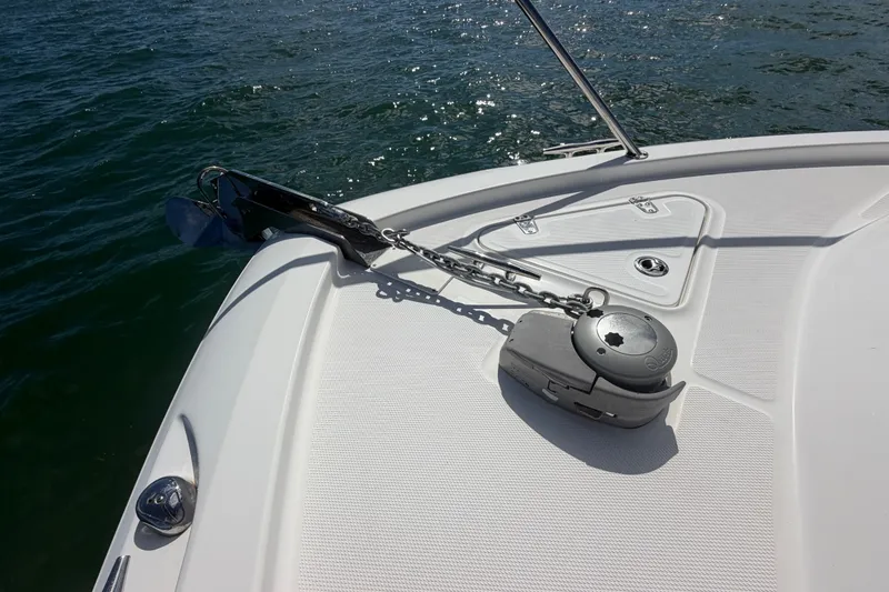 Slide: The Image of Bow of 2014 Boston Whaler 315 Conquest with anchor and winch system. - 58