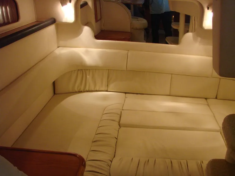 Slide: The Image of Interior of 2001 Sea Ray 340 Sundancer with beige upholstery. - 14