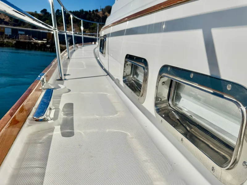 Slide: The Image of Close-up of a 2016 Sabre 48 Salon Express deck with stainless steel details. - 43